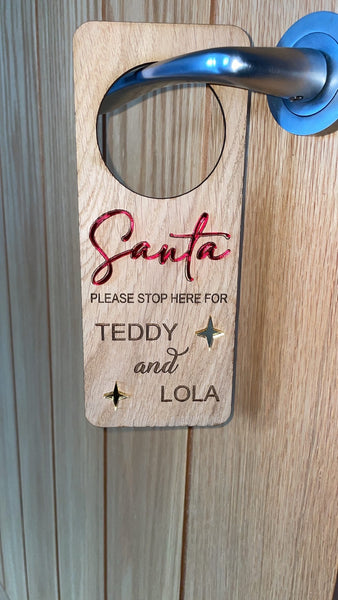 Sparkling Santa stop here sign